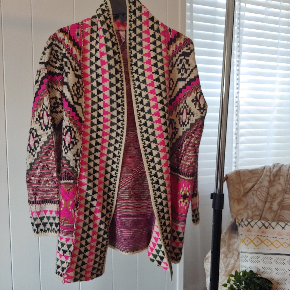 Francesca's pink cardigan